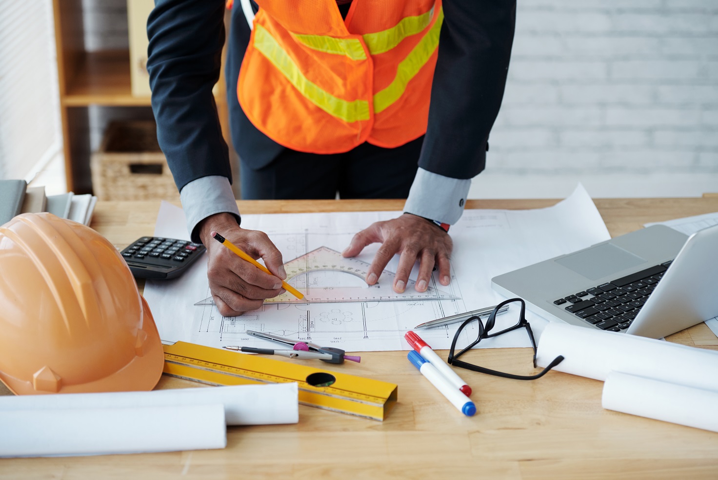 Cropped image of engineer drawing construction plan